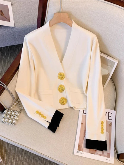 Elegante cárdigan vintage con botones dorados